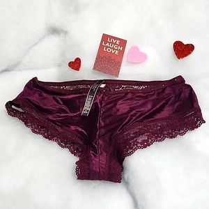 Victoria's Secret Cheeky Underwear in Size M. Has lace and decorative on back.